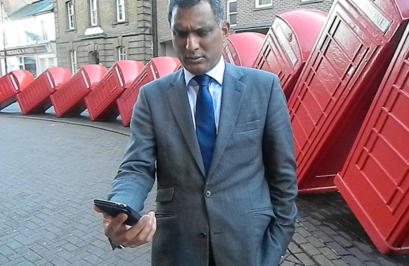 Syed with mobile phone
