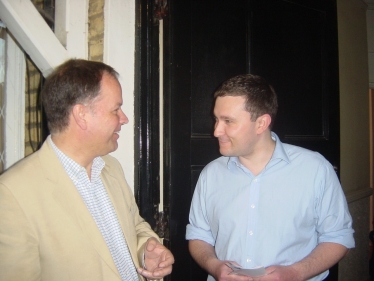 Michael talking with a Clapham resident during a campaign session 